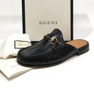 Gucci Black Leather Loafers with Gold Accents